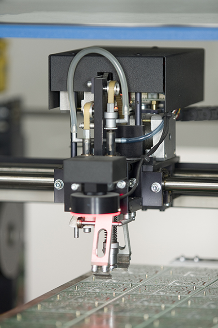 Tool heads for affixing surface-mount technology (SMT) subcomponents to a board Image of tool heads for affixing surface-mount technology (SMT) subcomponents to a board