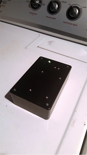 Image of 'black box” that rests atop the appliance