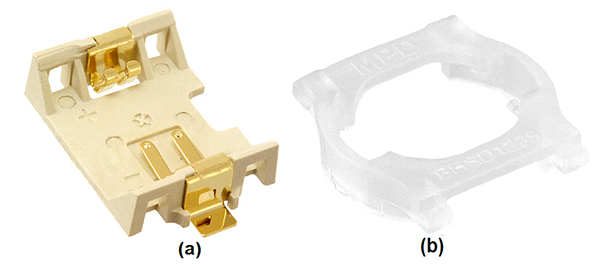 Image of 12 mm battery cell holder (a) along with its retainer (b)